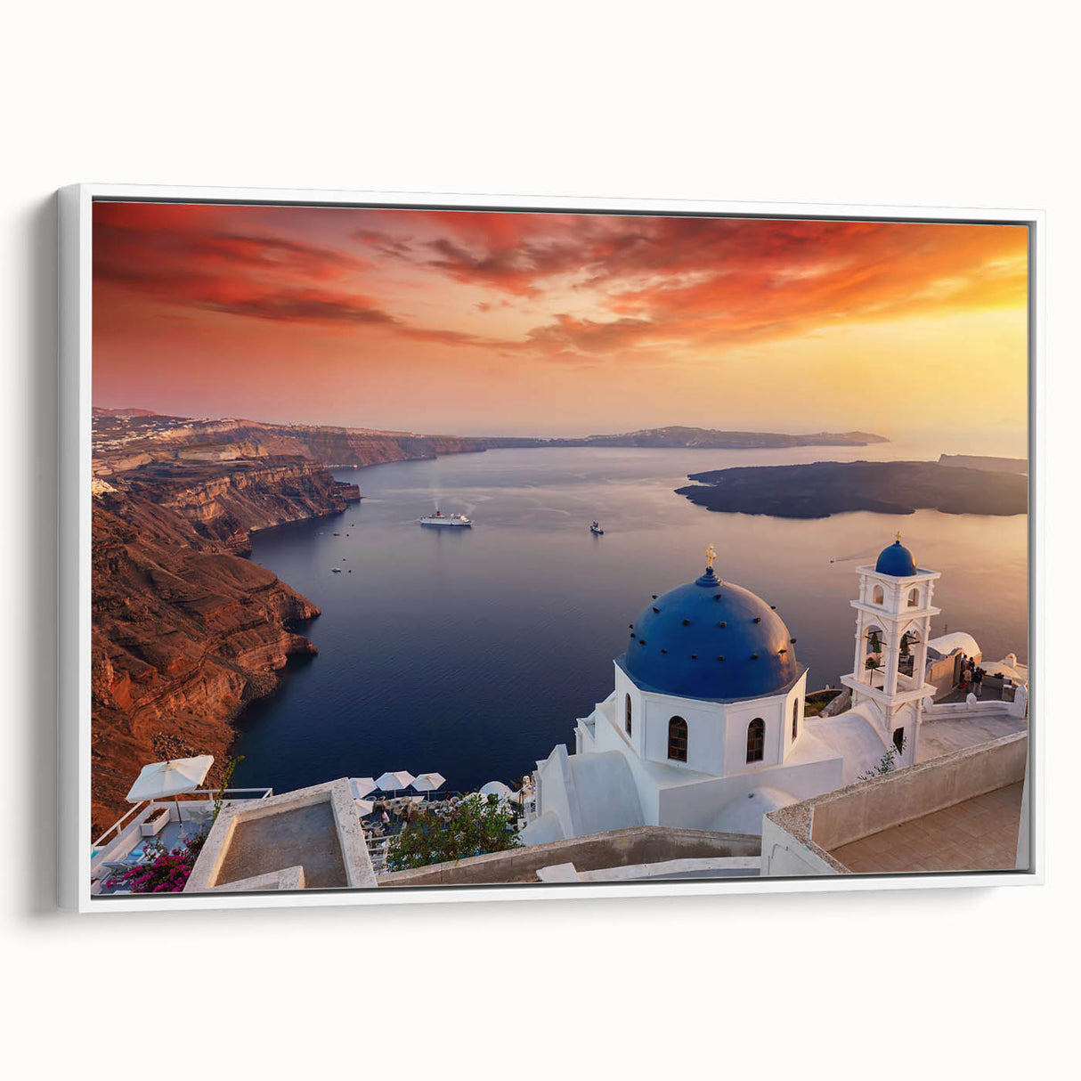 Vintage poster art of Santorini with vibrant blue and white tones on framed canvas, suited for living room decor.