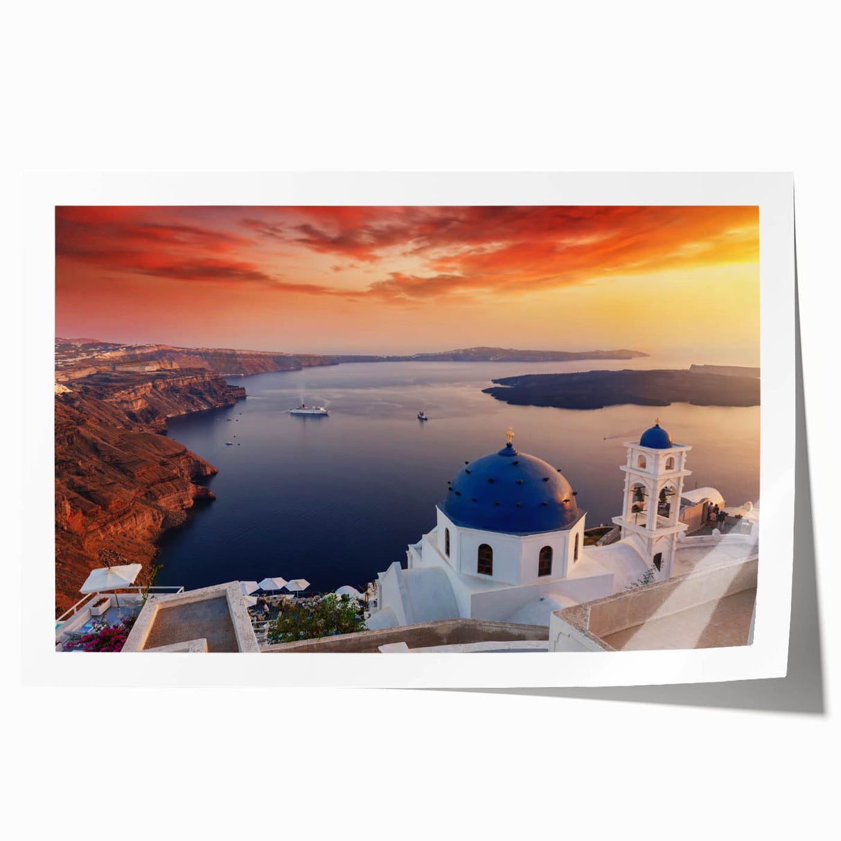 Rolled print of Santorini landscape with white buildings and blue rooftops, suitable for art wall dining room.