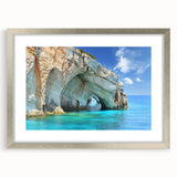 Extra large wall art depicting an abstract Greek scenery in textured blues and whites, framed in silver.
