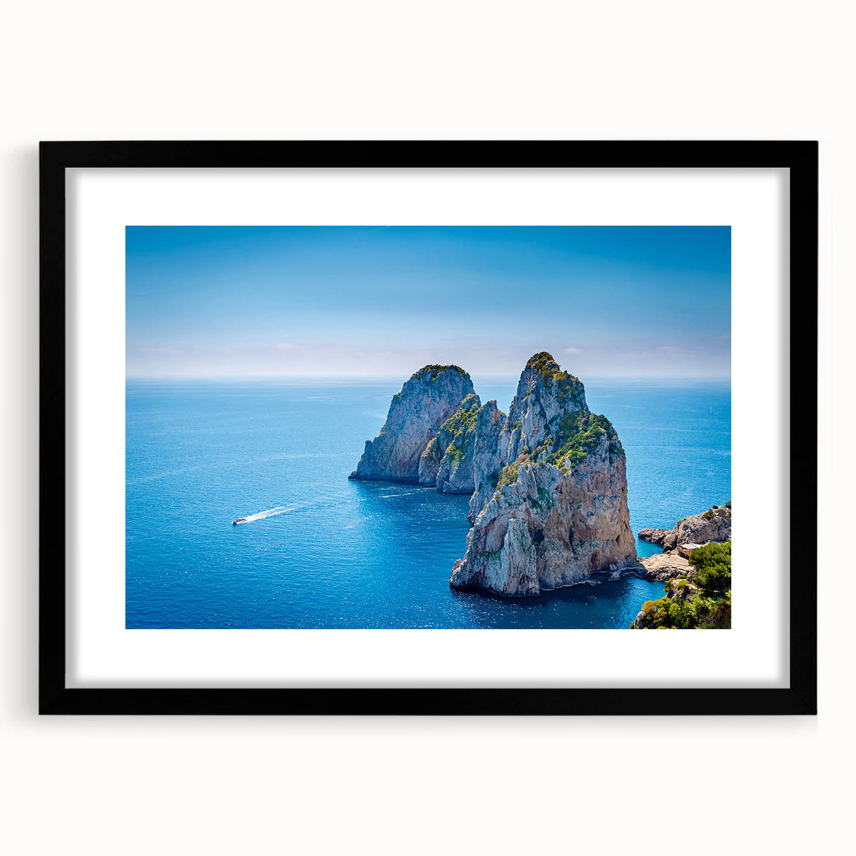 Colorful abstract art print of a European scenic view in vibrant hues, framed in black, ideal for living room decor.