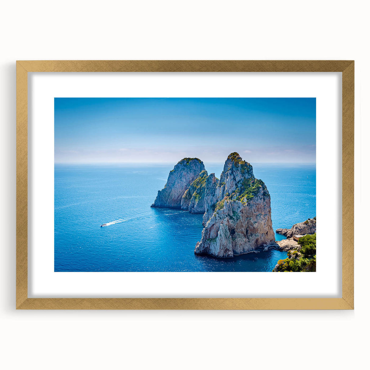 Abstract art print of a European seaside scene in muted blue and green hues, framed in gold, ideal for dining room decor.