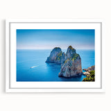 Textured art print of Capri, Italy in muted blue and green hues on a framed white mat, ideal for bedroom art.