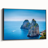 Black and white framed canvas of Capri landscape in vintage poster style, suited for bedroom decor.