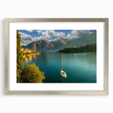 Extra large wall art of Lake Como with textured abstract design in muted blues and greens, framed in silver.