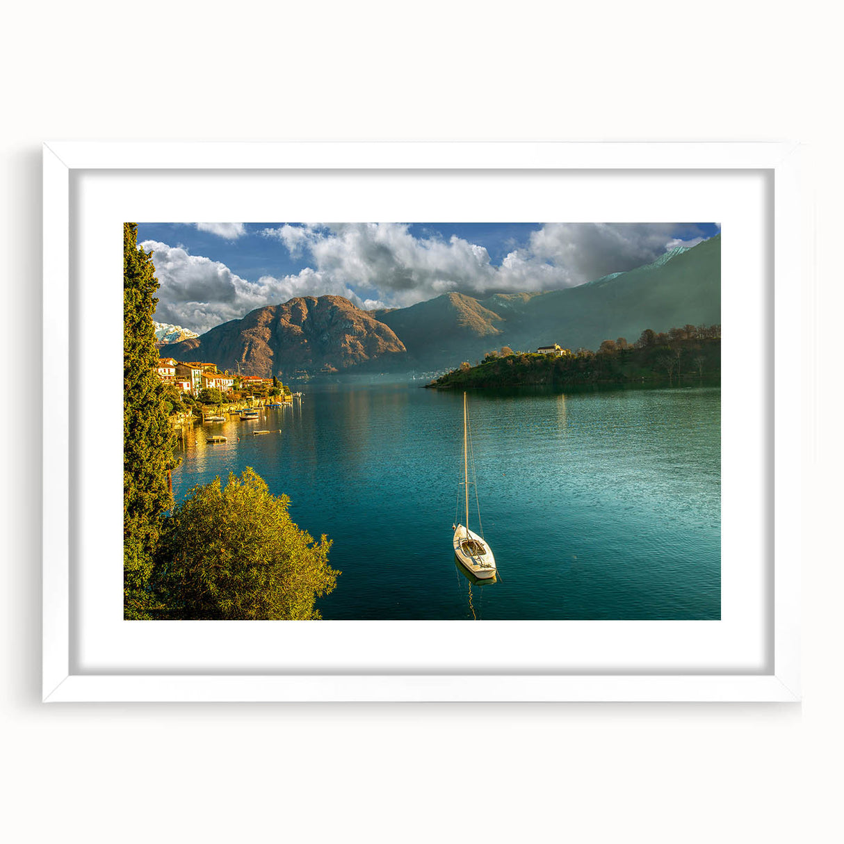 Textured art print of Lake Como with muted blue and green tones on a framed white mat, suitable for bedroom wall decor.