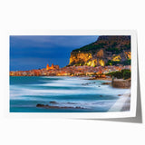 Rolled print of Sicilian landscape with vibrant floral foreground and serene blue sky, ideal for dining room wall art.