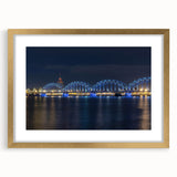 Abstract art print of a European landscape in muted earth tones, framed in gold, suitable for dining room decor.