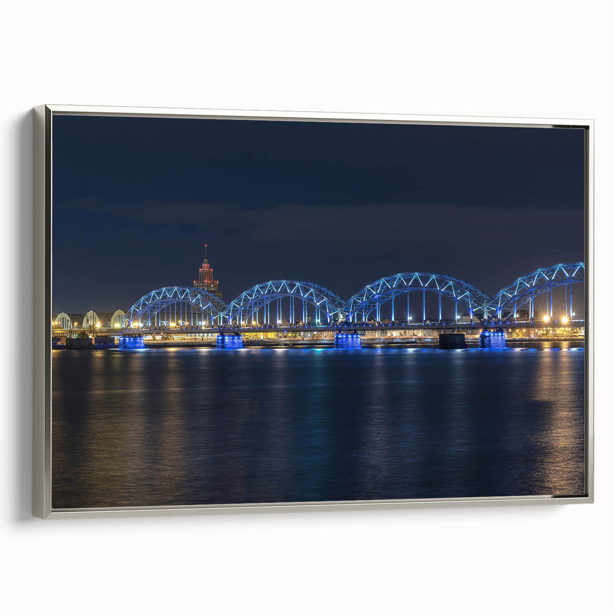 Framed canvas depicting a vintage-style landscape painting of a European scene in Latvia.