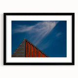 Extra large, colorful abstract art print of a European scenery in Lithuania, on a black framed canvas with a mat.