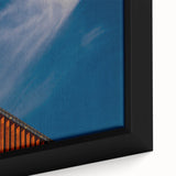 Extra large framed canvas featuring a textured black wall art scene of a European cityscape with colorful accents.