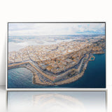 Mid-century modernist art depicting a European Malta scenery in muted blue and white tones on a framed acrylic print.