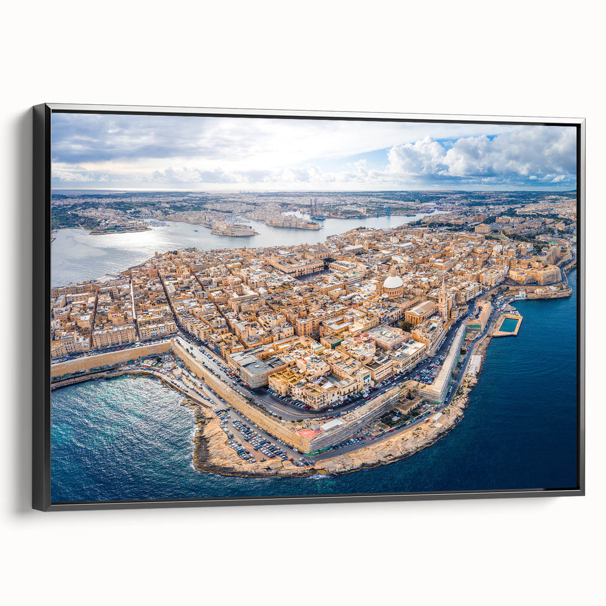 Black and white wall art featuring a vintage poster-style landscape of Malta on a framed canvas, suitable for bedroom decor.