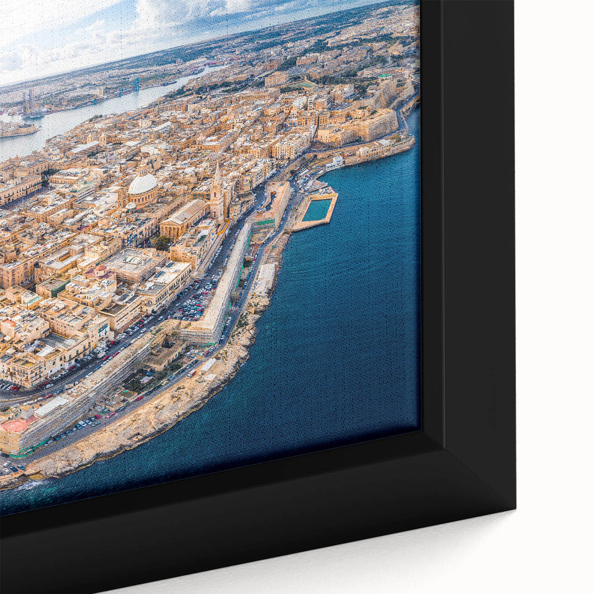 Extra large framed canvas featuring a textured depiction of a European Malta scenery in black with colorful art accents.