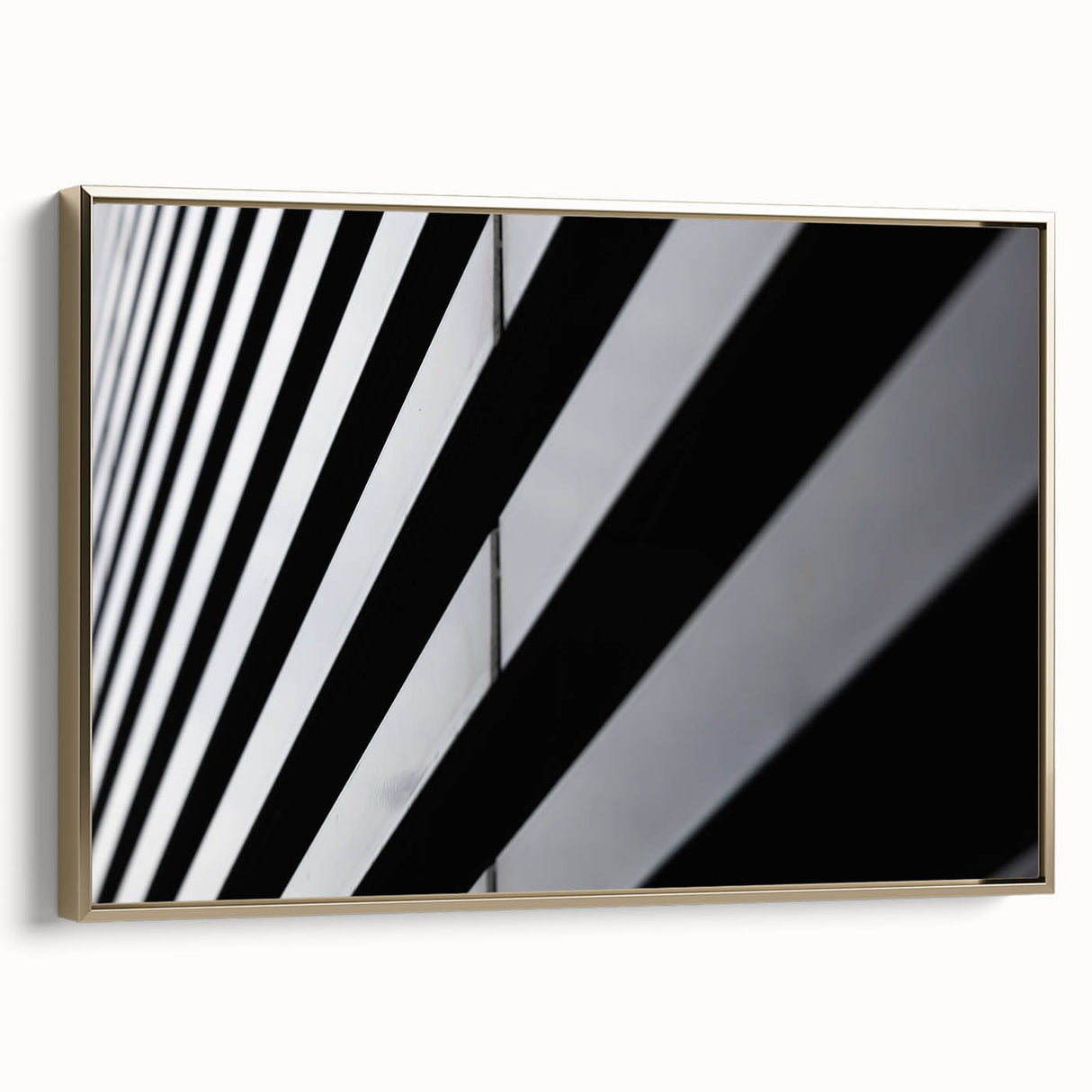 Framed canvas of Amsterdam landscape with vintage poster style in black and gold tones, ideal for bedroom wall art.