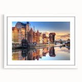 Textured abstract art print depicting a European scenery in muted earth tones, framed with a white mat.