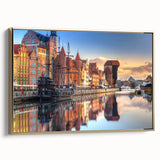 Framed canvas featuring a vintage-style landscape painting of a Polish scenery in muted gold and black tones.