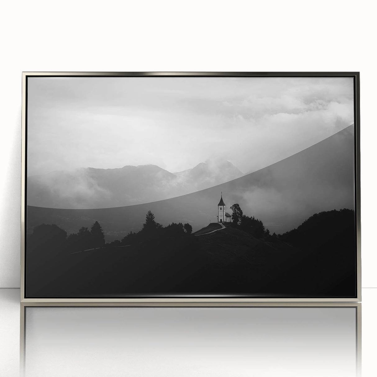 Art Deco poster of a Slovenian landscape in silver framed acrylic, with soft pastel colors.