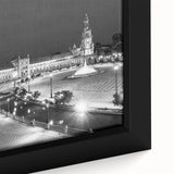 Close-up of a black wall art featuring a textured, colorful Andalucian scenery on a framed canvas.