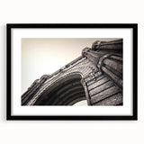 Extra large abstract art print of Barcelona with vibrant, colorful textures on a framed black matte canvas.