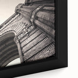 Extra large framed canvas of a textured Barcelona cityscape in black with colorful accents, suited for living room decor.