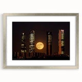 Textured abstract art print depicting Madrid scenery in muted earth tones, framed in silver, ideal for bedroom art.