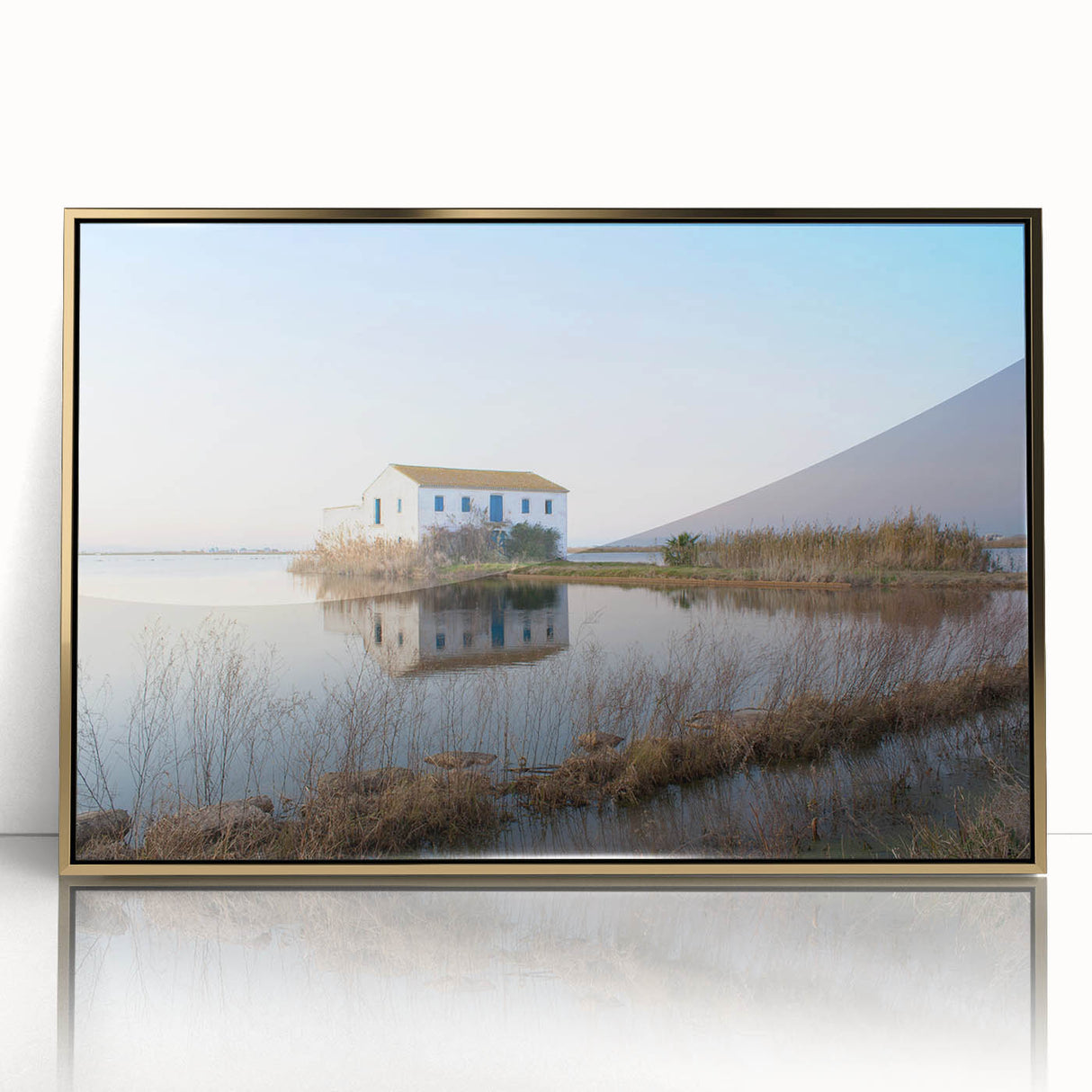 Mid-century modernist art depicting Valencia scenery in gold and blue tones on a framed acrylic.