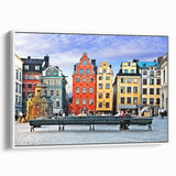 Vintage poster art of a scenic European landscape in vibrant colors on a framed canvas, ideal for living room decor.