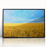 Large abstract wall art featuring a mid-century modernist style with vibrant colors on a framed acrylic.