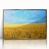 Large art print of a serene Ukrainian landscape in muted green and gold tones, framed in acrylic.