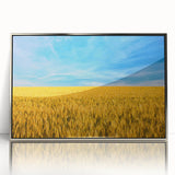 Mid-century modernist art depicting a European landscape in muted earth tones on a silver-framed acrylic print.