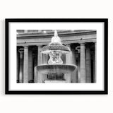 Colorful abstract art print of a European scenery, in a black frame with mat, ideal for living room decor.