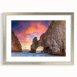 Textured abstract art print of Baja California scenery in muted earth tones on a framed silver mat, suitable for bedroom art.