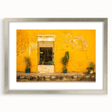 Textured abstract art print of Mexico City, in muted earth tones on a framed canvas, suitable for bedroom decor.