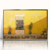 Mid-century modernist art of Mexico City landscape in silver framed acrylic, featuring muted earth tones.