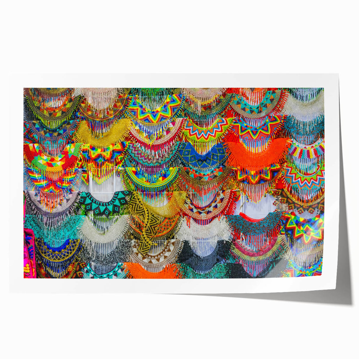Extra large rolled print of Oaxaca scenery with vibrant floral designs.