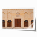 Rolled print of Dubai skyline with muted earth tones, ideal for dining room wall art.