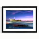 Colorful abstract art print depicting Middle Eastern scenery in vibrant hues on a large textured canvas, framed in black.