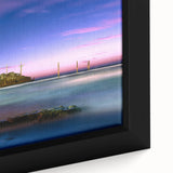 Extra large framed canvas featuring a textured depiction of a Middle Eastern scenery in black with colorful accents.