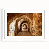 Abstract art print featuring a stylized Middle East scenery in muted earth tones on a white framed mat.