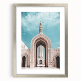 Textured abstract art print depicting a Middle Eastern landscape, in muted earth tones on a framed silver mat.