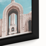 Close-up of textured black wall art depicting a Middle Eastern Oman scenery on a framed canvas.