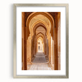 Textured abstract art print depicting a desert scene in muted earth tones, framed in silver, suitable for bedroom art.