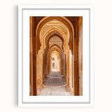 Abstract art print featuring a monochrome depiction of a Saudi Arabian landscape, framed in white.