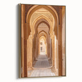 Framed canvas wall art featuring a vintage-style landscape of Saudi Arabia in gold and black tones, ideal for bedroom decor.