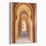 Vintage poster art of a Middle Eastern scene on a framed canvas, featuring colorful details on a black background.