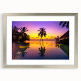 Textured art depicting an abstract oceanic scene in cool blue and green hues, framed with a silver mat.