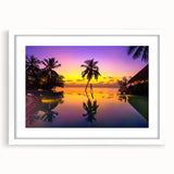 Abstract art print of a serene ocean view in soft blue and white tones on a framed canvas.