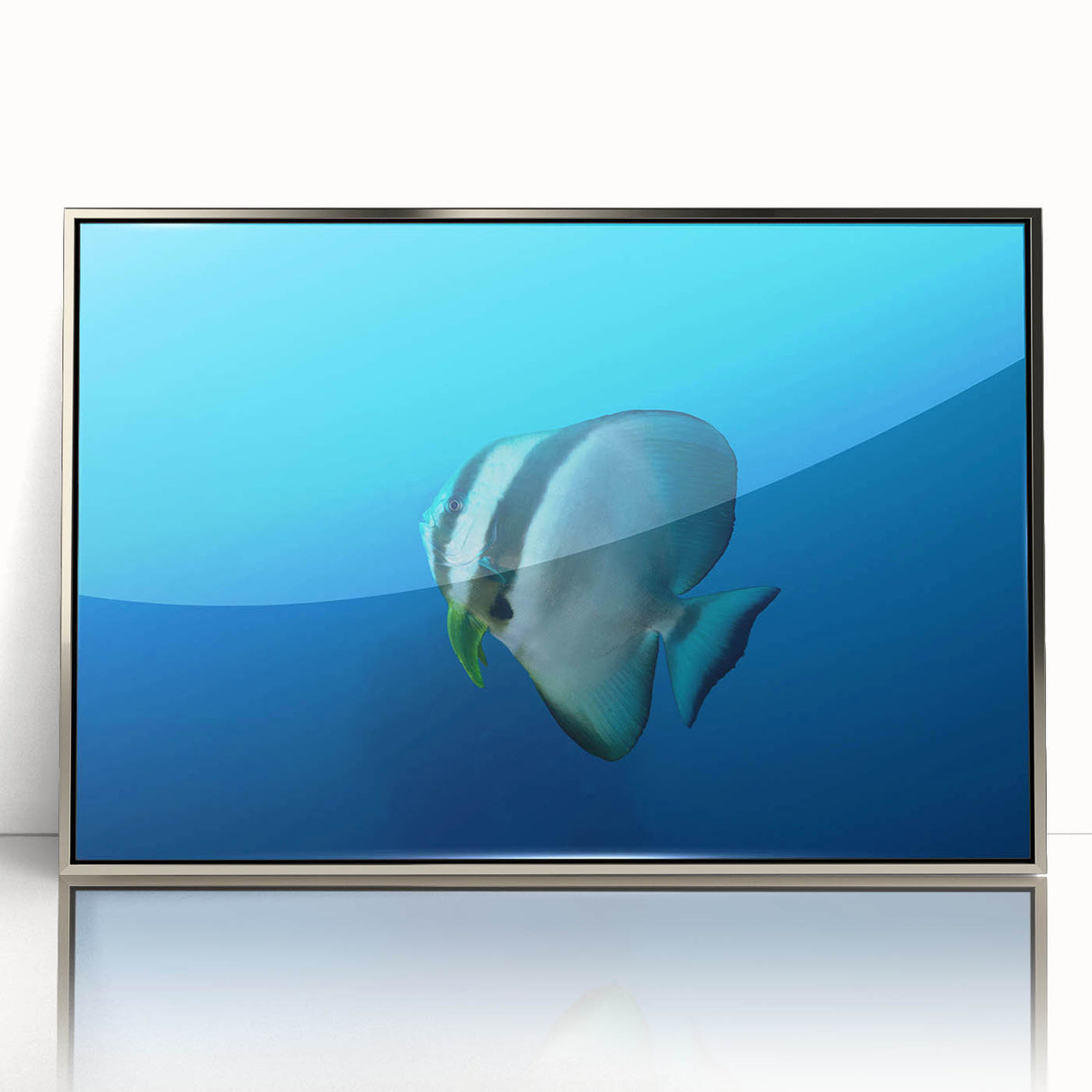 Mid-century modernist art depicting the ocean in muted blue and green hues, framed in silver acrylic.