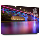 Large abstract depiction of Auckland skyline in muted blue and gray tones on acrylic glass.