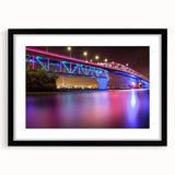 Abstract art print of Auckland's skyline in vibrant colors on a large canvas, ideal for living room decor.